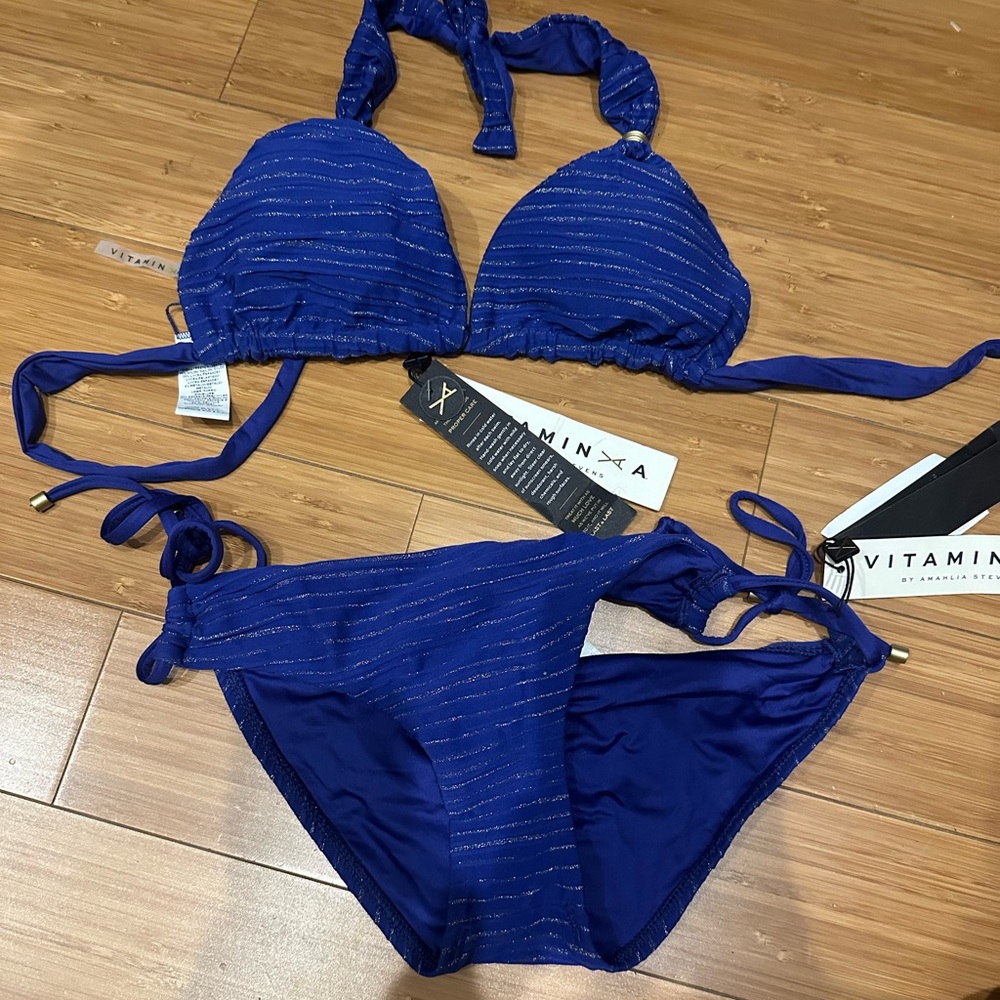 Vitamin A bikini size 6 bottom size 8 top blue with gold shimmer. New w tags